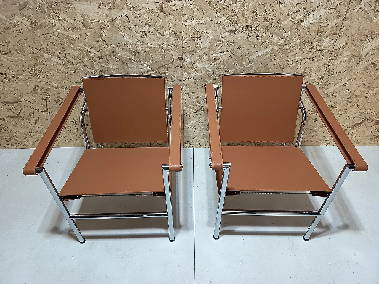 Pair of LC1 armchairs by Alivar in Cognac natural leather, 2000s 8