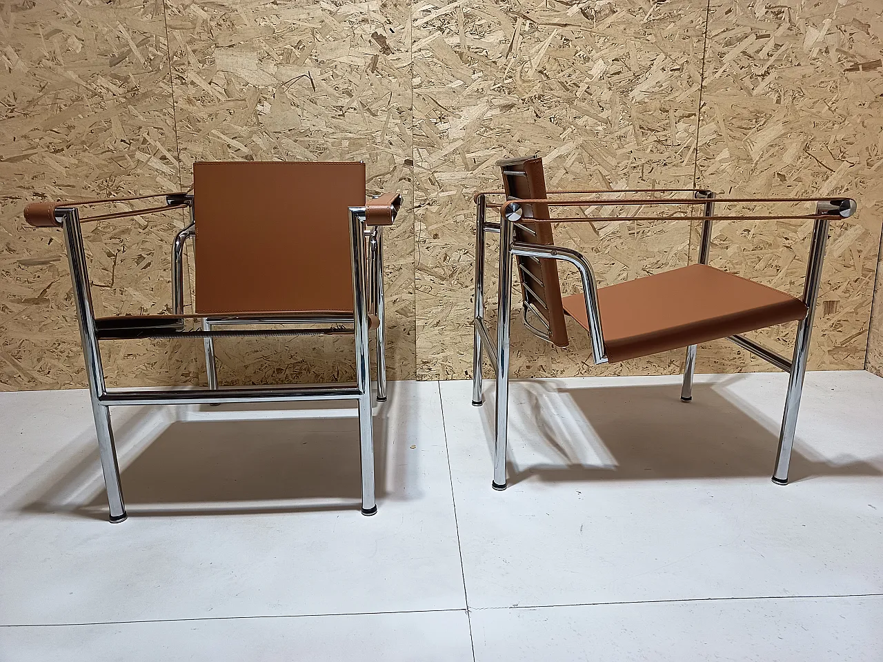Pair of LC1 armchairs by Alivar in Cognac natural leather, 2000s 24