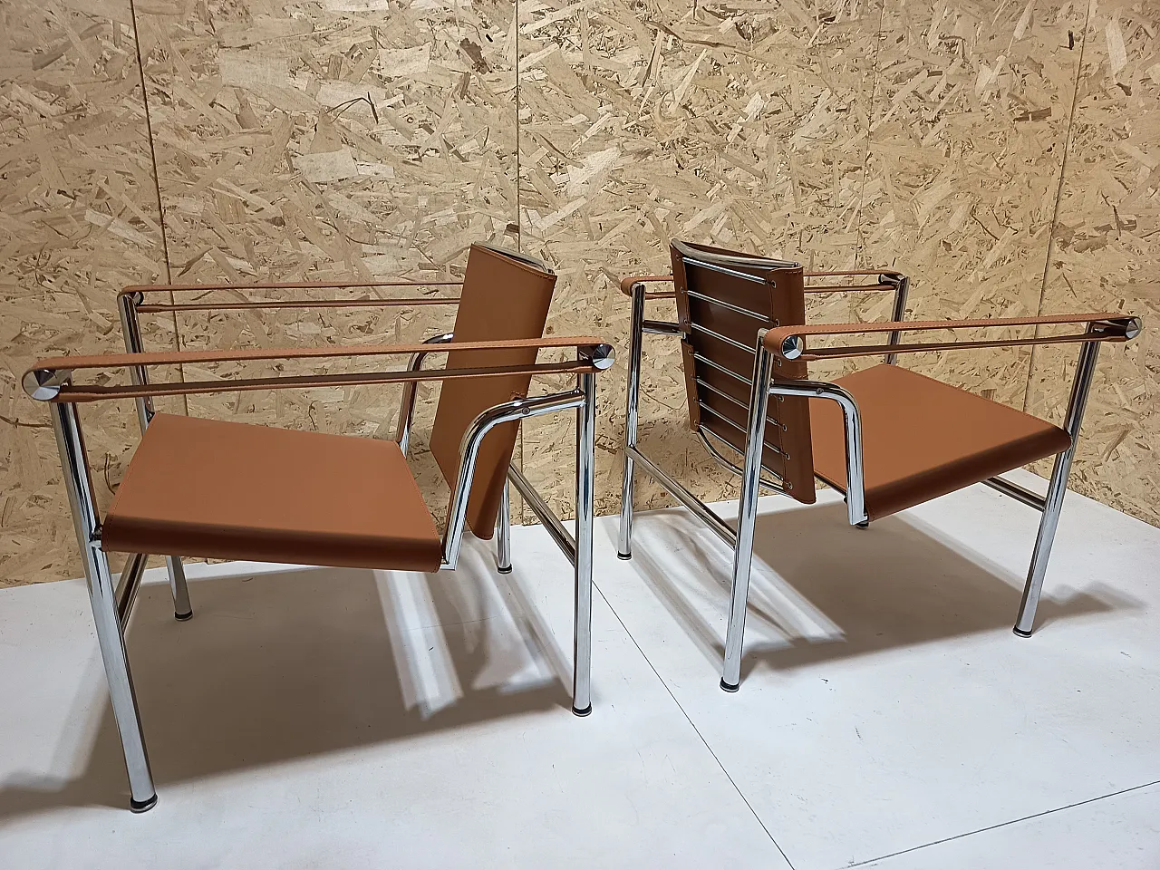 Pair of LC1 armchairs by Alivar in Cognac natural leather, 2000s 40