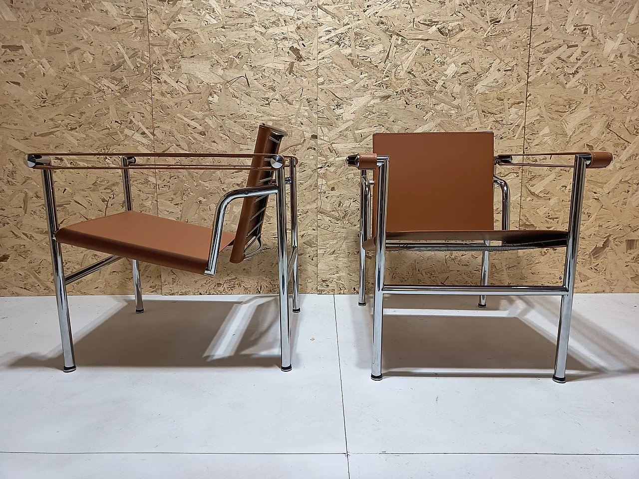 Pair of LC1 armchairs by Alivar in Cognac natural leather, 2000s 46
