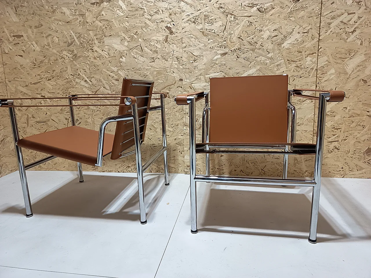 Pair of LC1 armchairs by Alivar in Cognac natural leather, 2000s 52