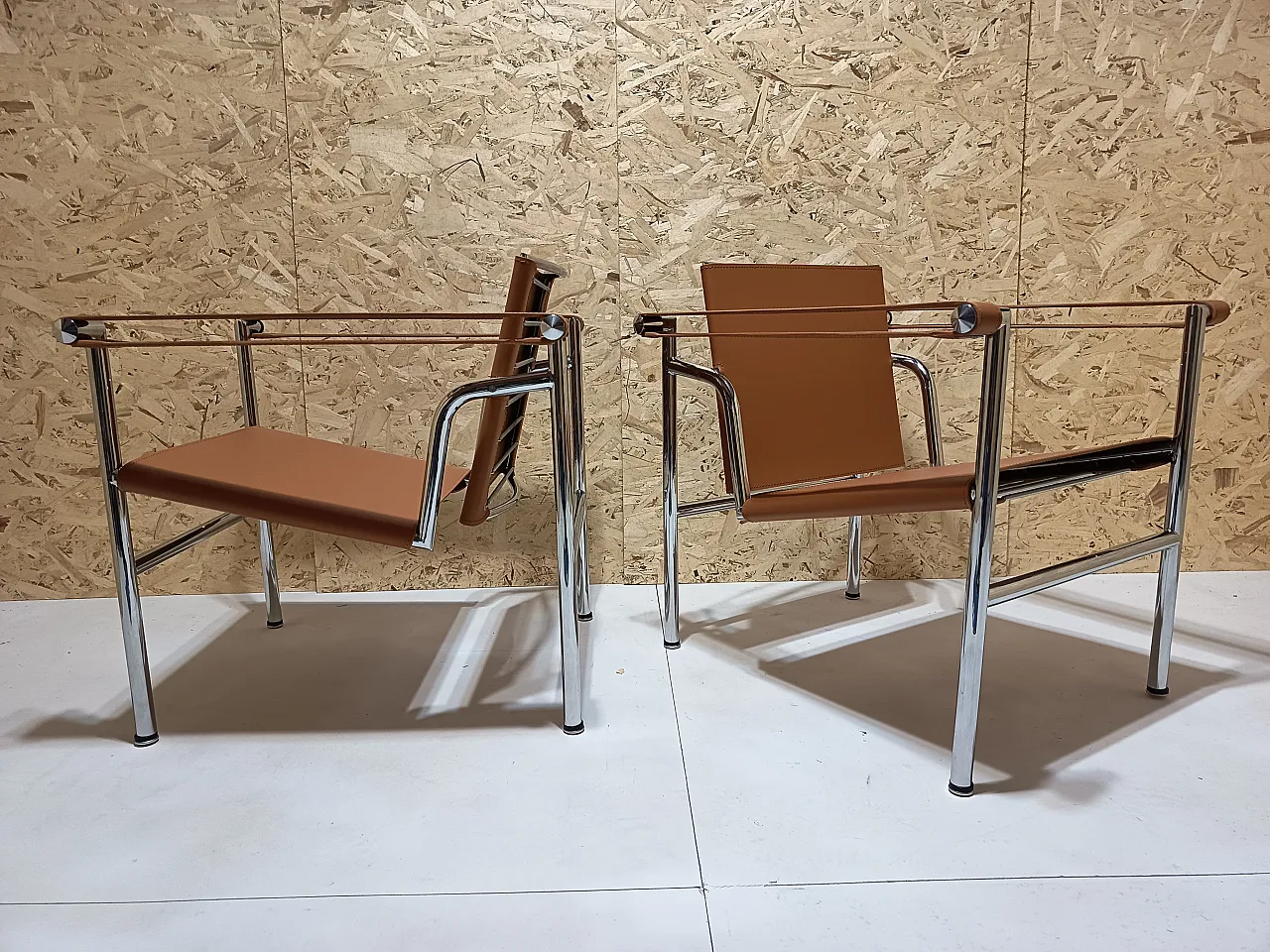 Pair of LC1 armchairs by Alivar in Cognac natural leather, 2000s 57