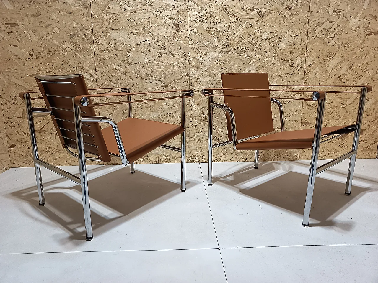 Pair of LC1 armchairs by Alivar in Cognac natural leather, 2000s 69