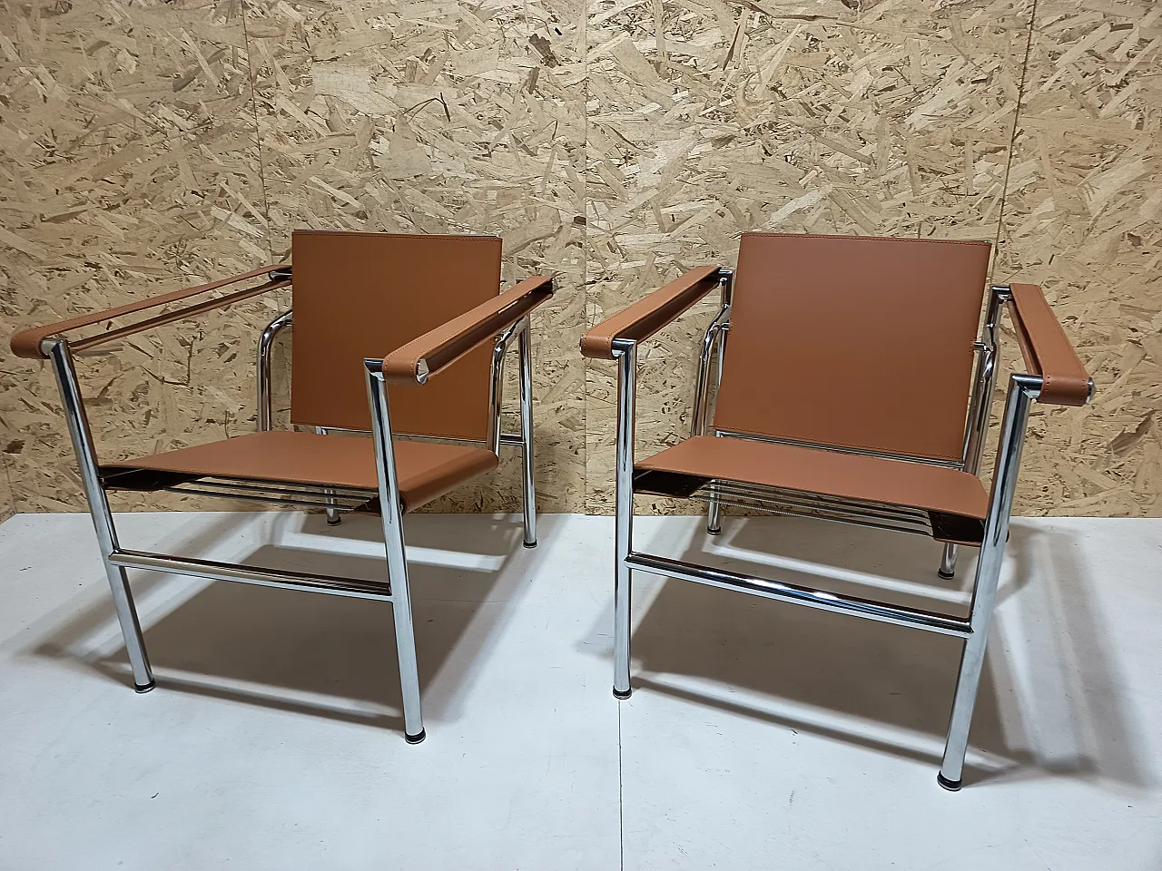 Pair of LC1 armchairs by Alivar in Cognac natural leather, 2000s 85