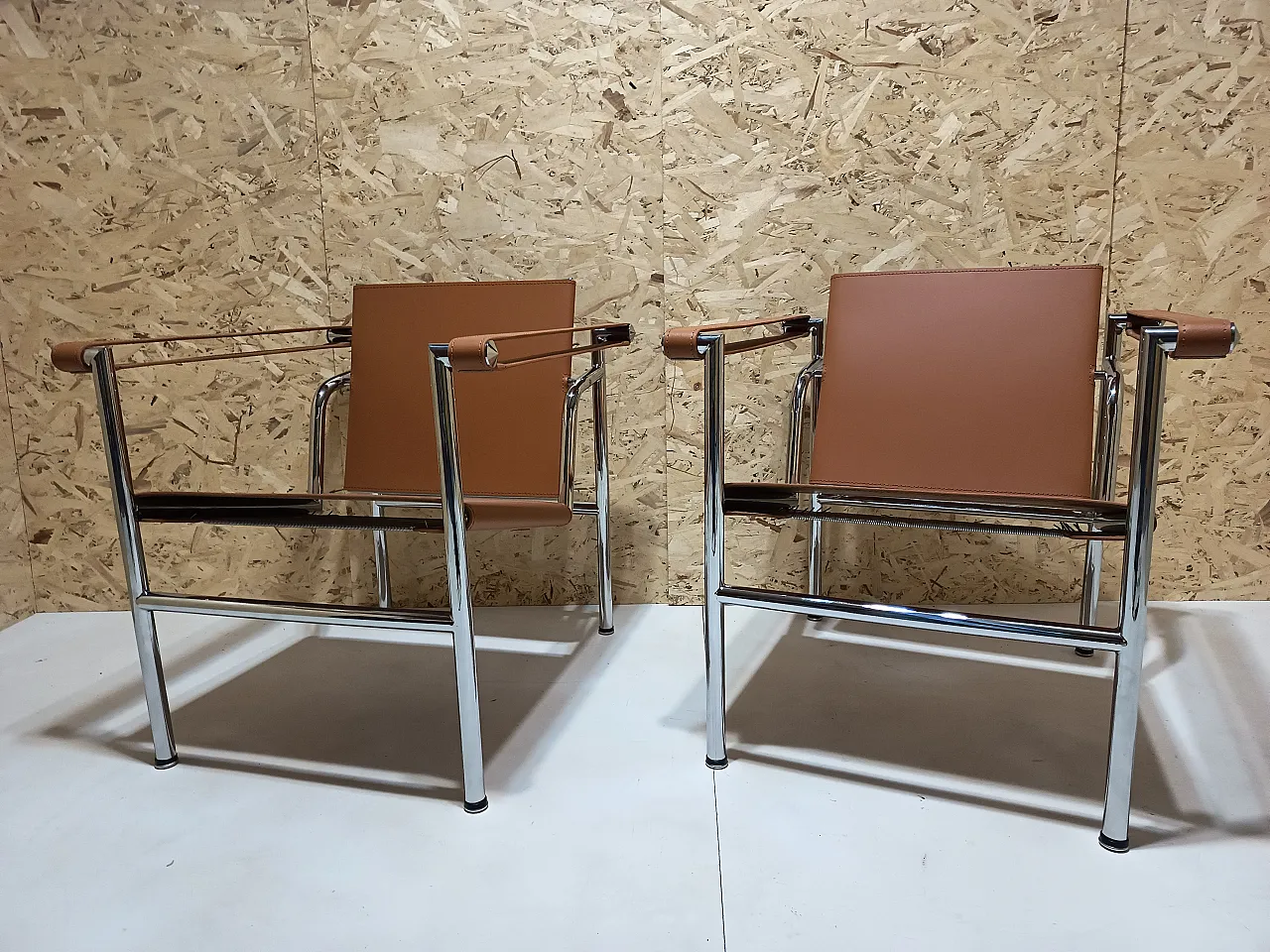 Pair of LC1 armchairs by Alivar in Cognac natural leather, 2000s 86
