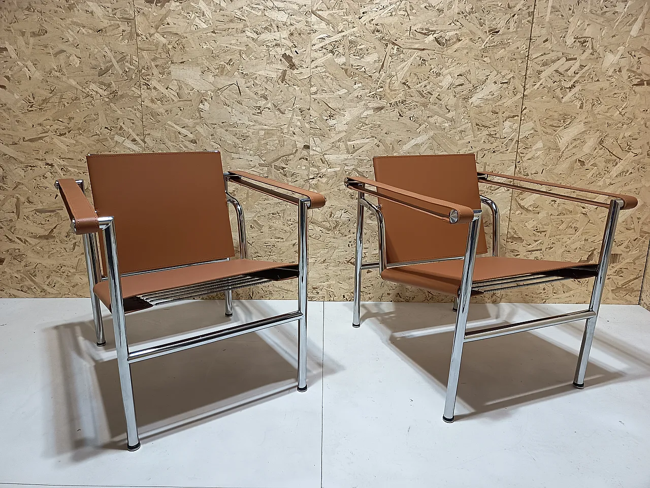 Pair of LC1 armchairs by Alivar in Cognac natural leather, 2000s 88