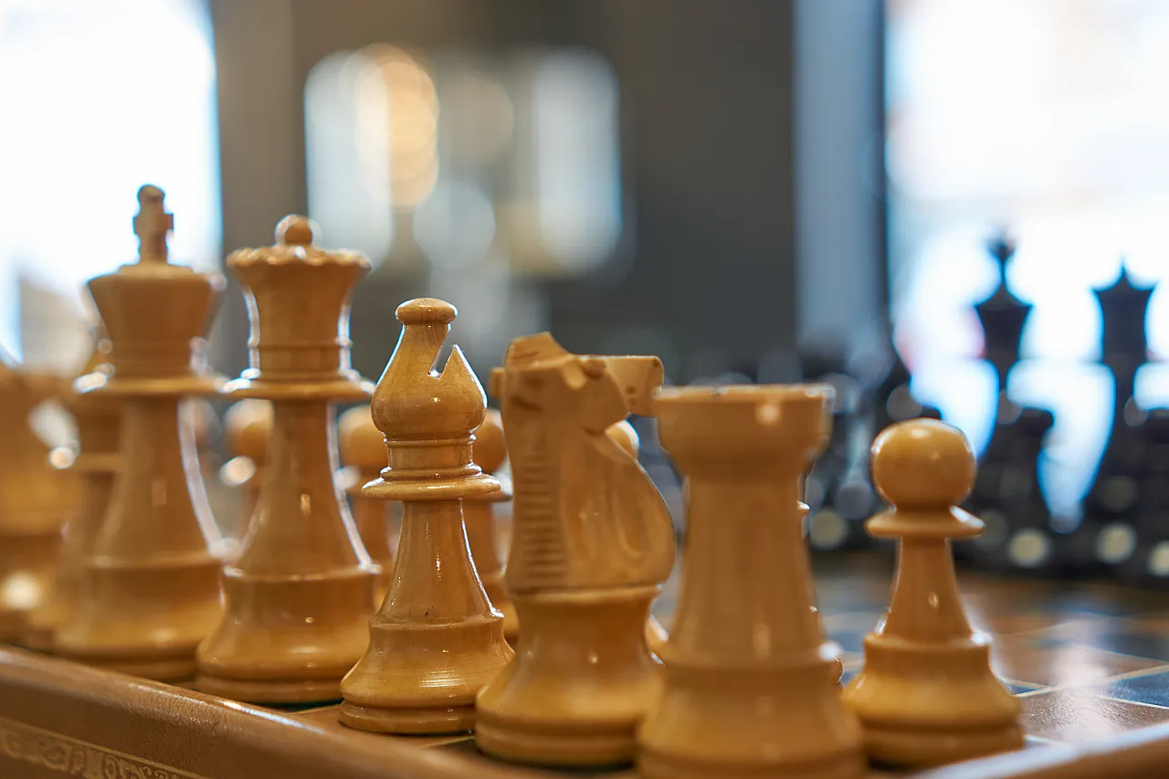 Chessboard with drawer covered in leather, 70s 17