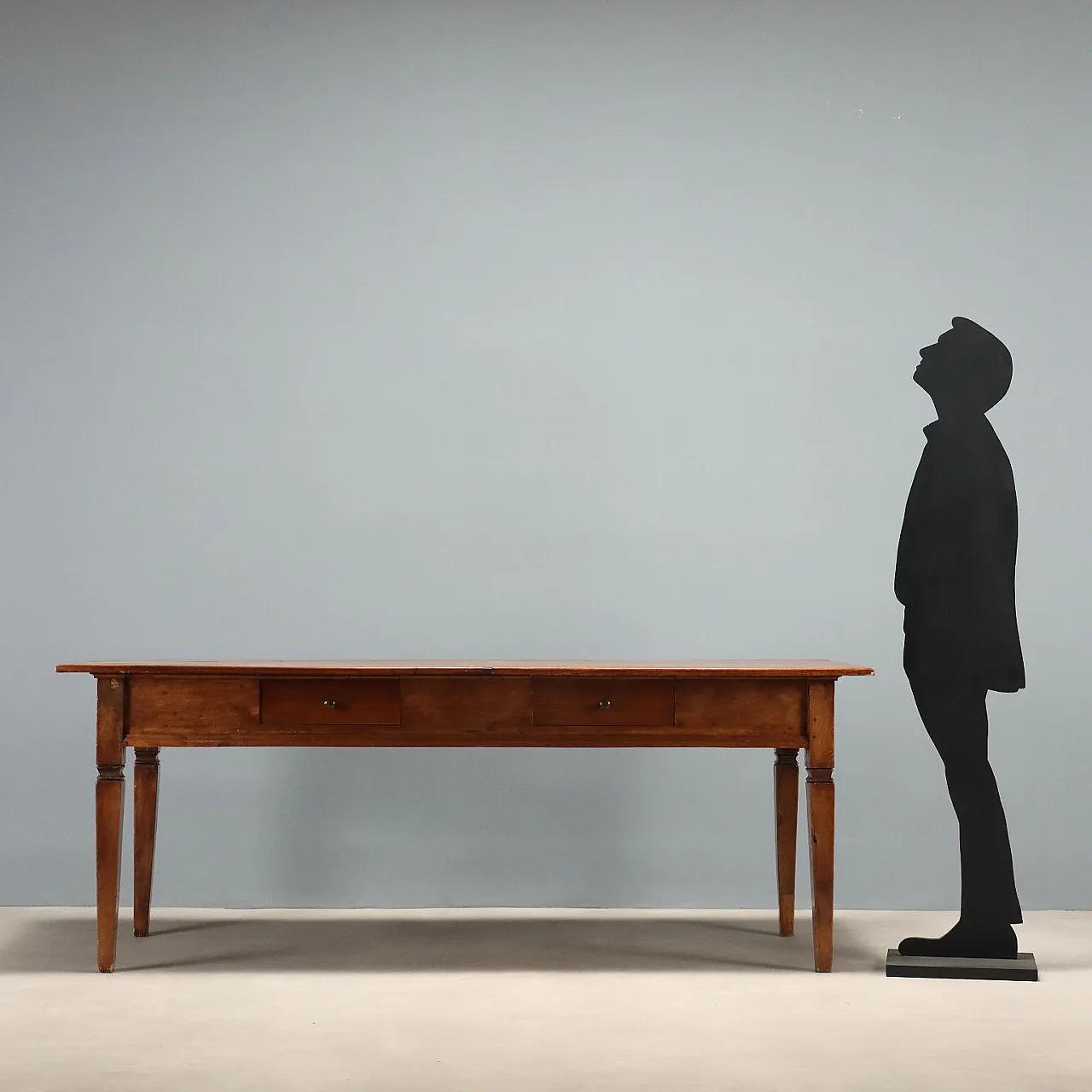 Directory table in walnut, 19th century 2