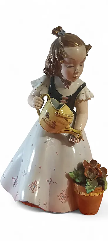 Bambina con innaffiatoio e vaso di fiori in porcellana XX sec. Italy