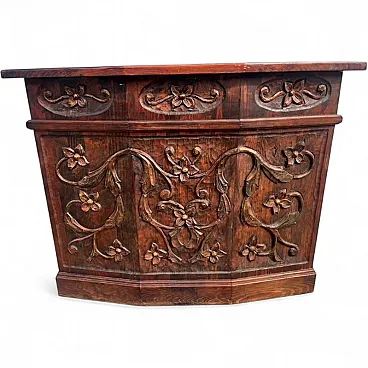 Liberty carved solid wood stall with floral motifs, 20th century