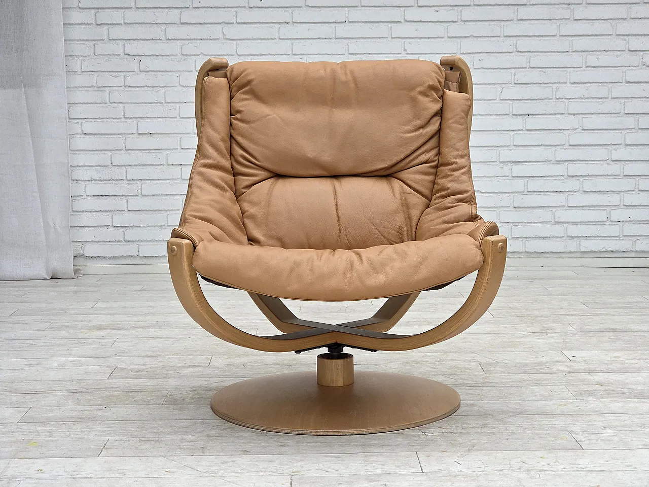 1980s, Scandinavian swivel armchair, furniture leather, bent wood. 1
