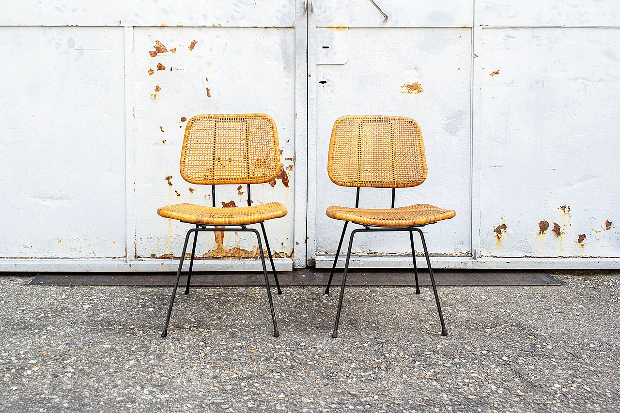 Pair of 550 dining chairs in wicker by Dirk Van Sliedregt, 1950s 1