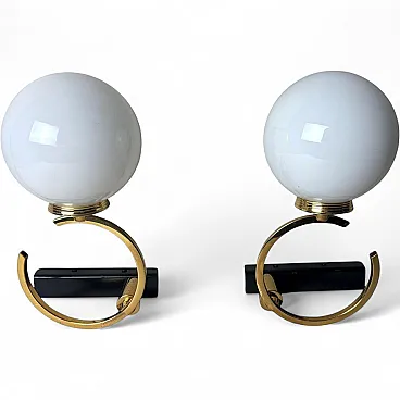 Maison Lunel style pair of brass and opaline glass sconces, 1950s