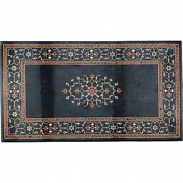 Top in black marble with inlaid workmanship, 20th century