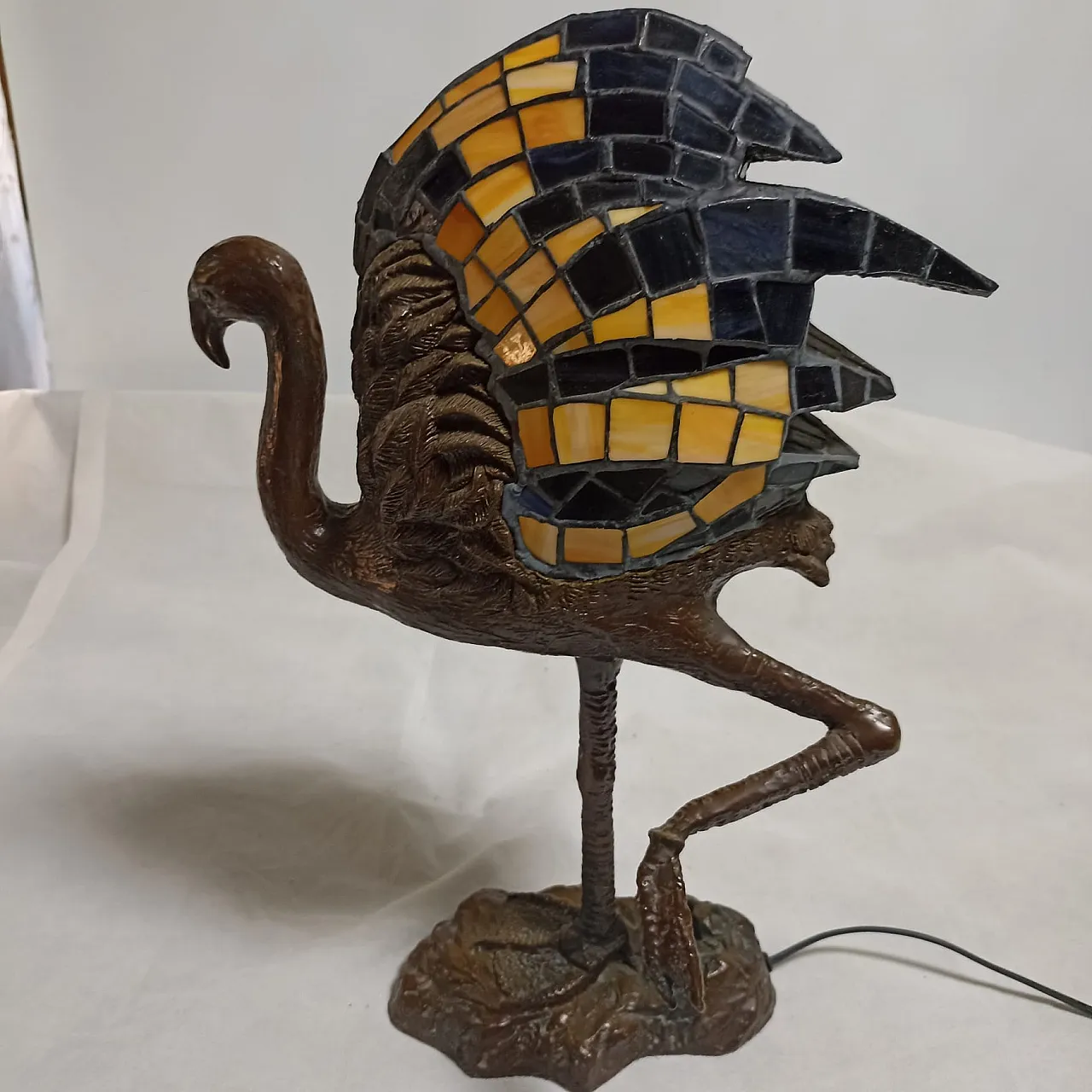 Tiffany style flamingo lamp with patinated bronze base. 31