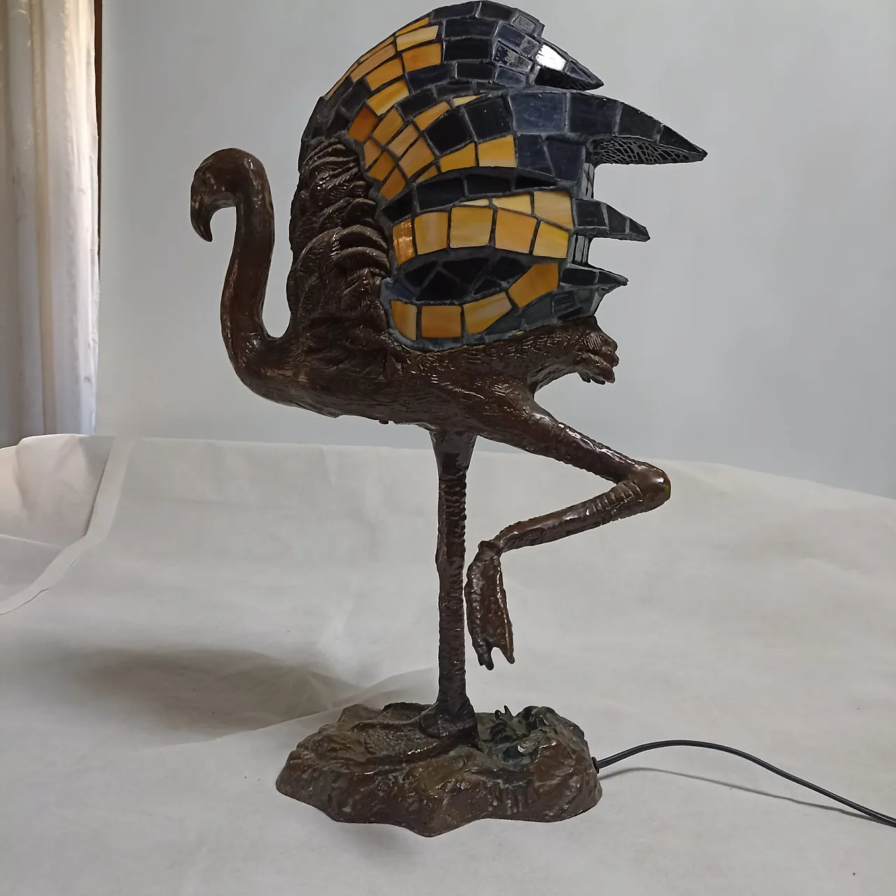 Tiffany style flamingo lamp with patinated bronze base. 34