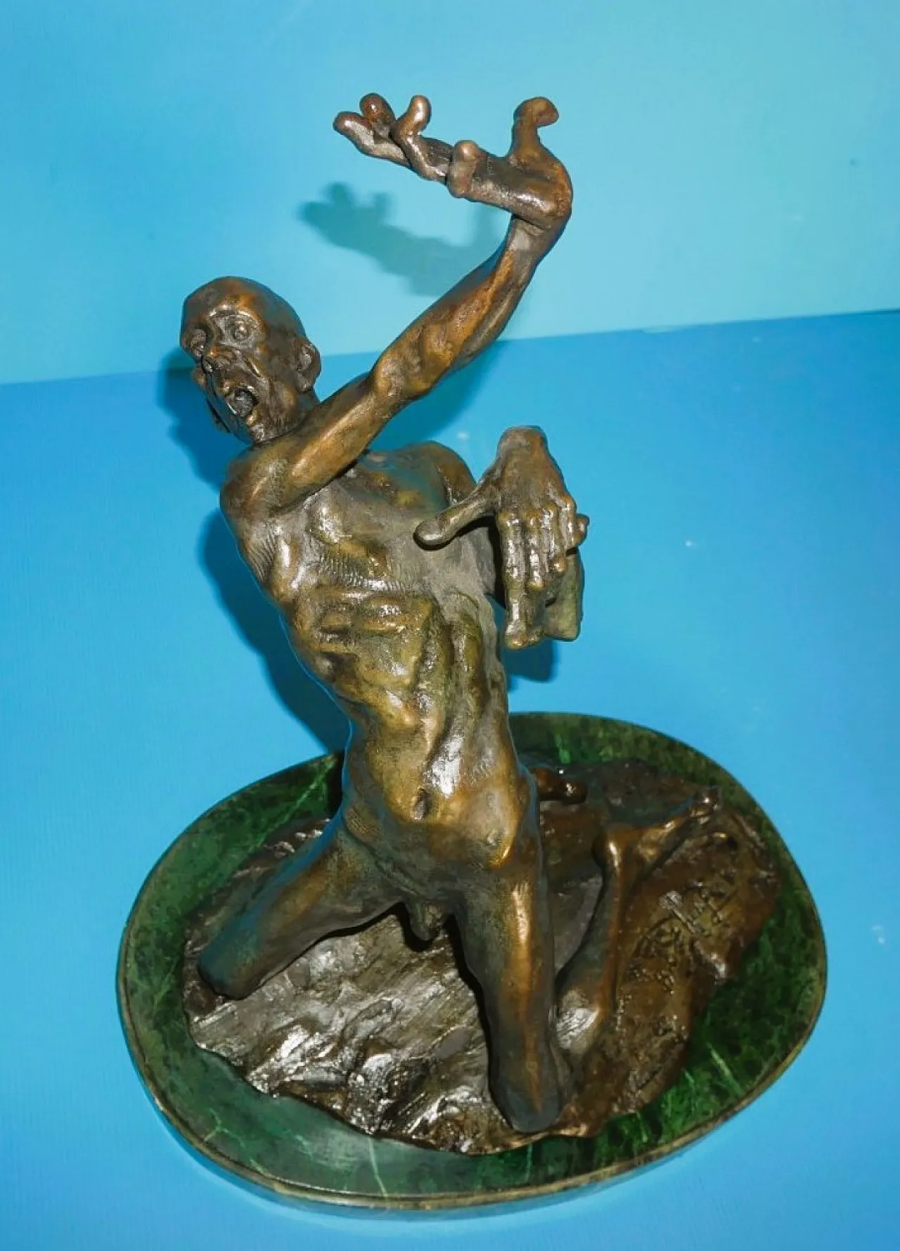 Patinated bronze sculpture signed B.C. Zheng 1