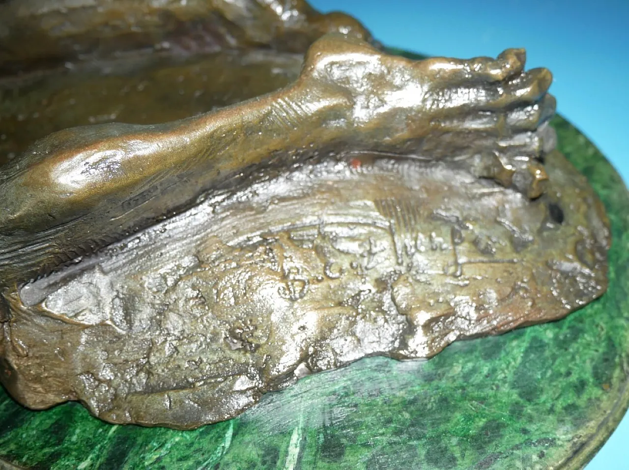Patinated bronze sculpture signed B.C. Zheng 3