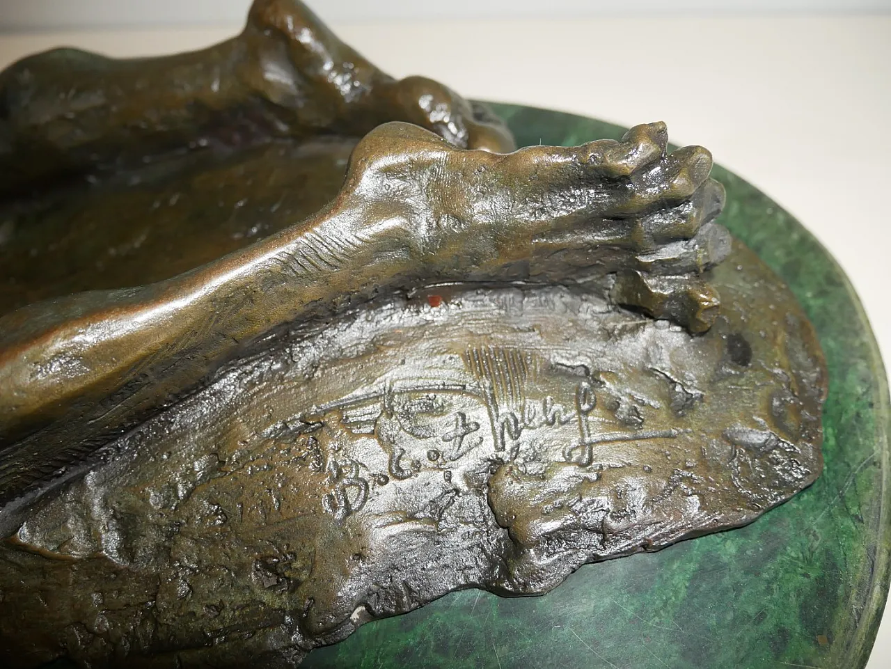Patinated bronze sculpture signed B.C. Zheng 4