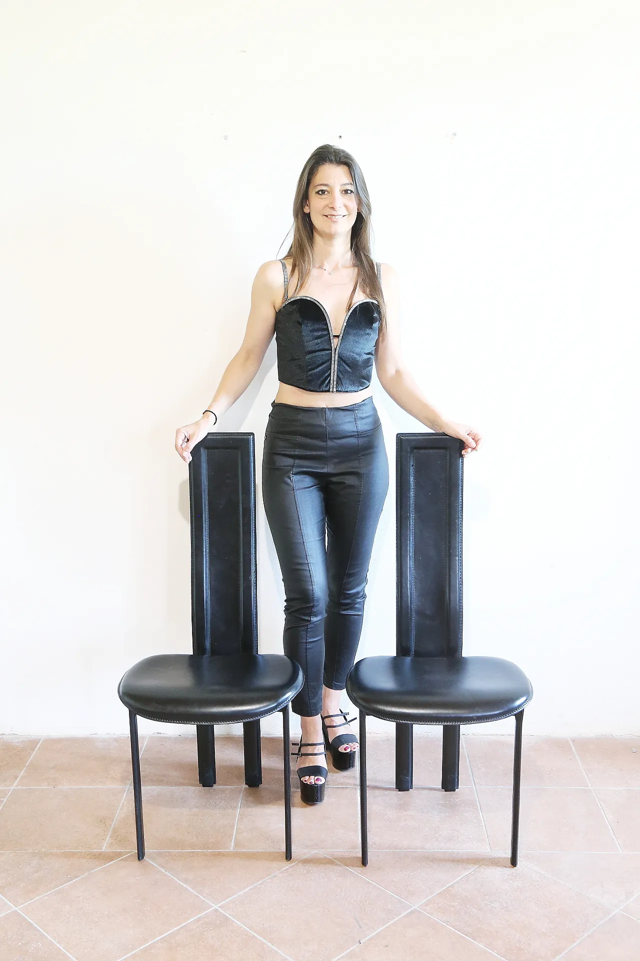 Pair of black leather Alice chairs by Giorgio Cattelan, 1980s 1