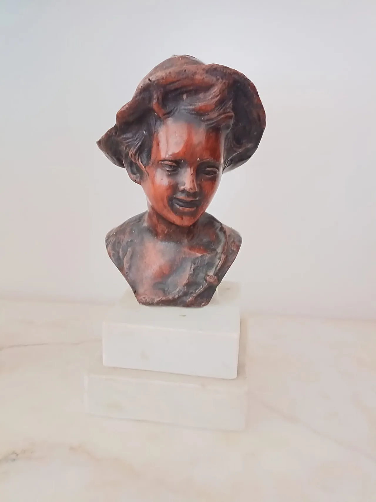 Bust of a young boy with hat, early 20th century 1
