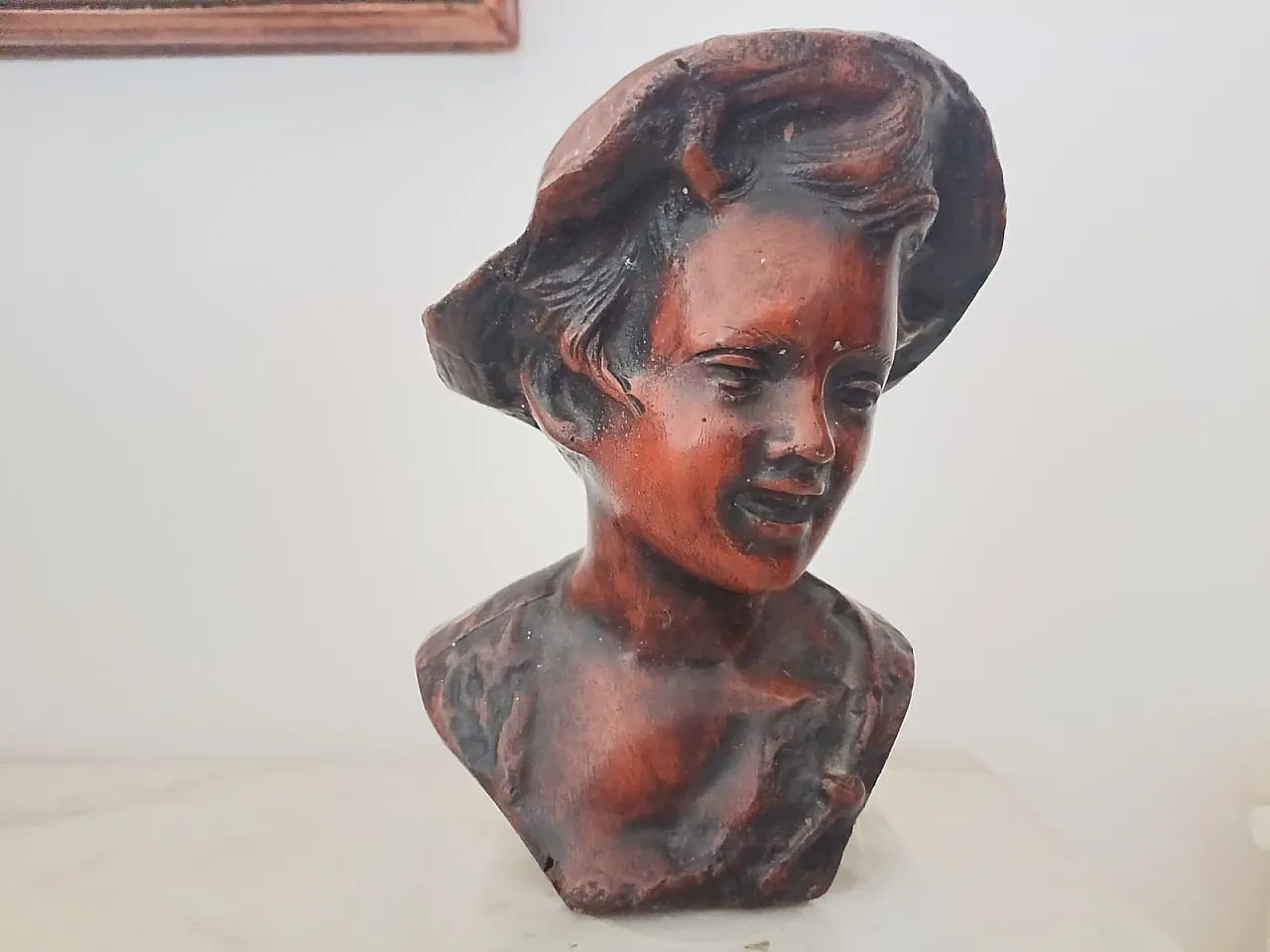 Bust of a young boy with hat, early 20th century 2