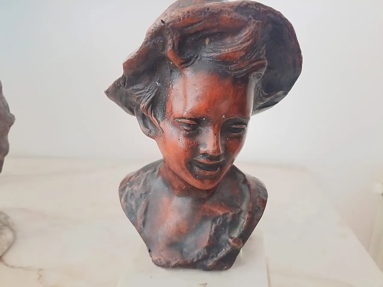 Bust of a young boy with hat, early 20th century 7