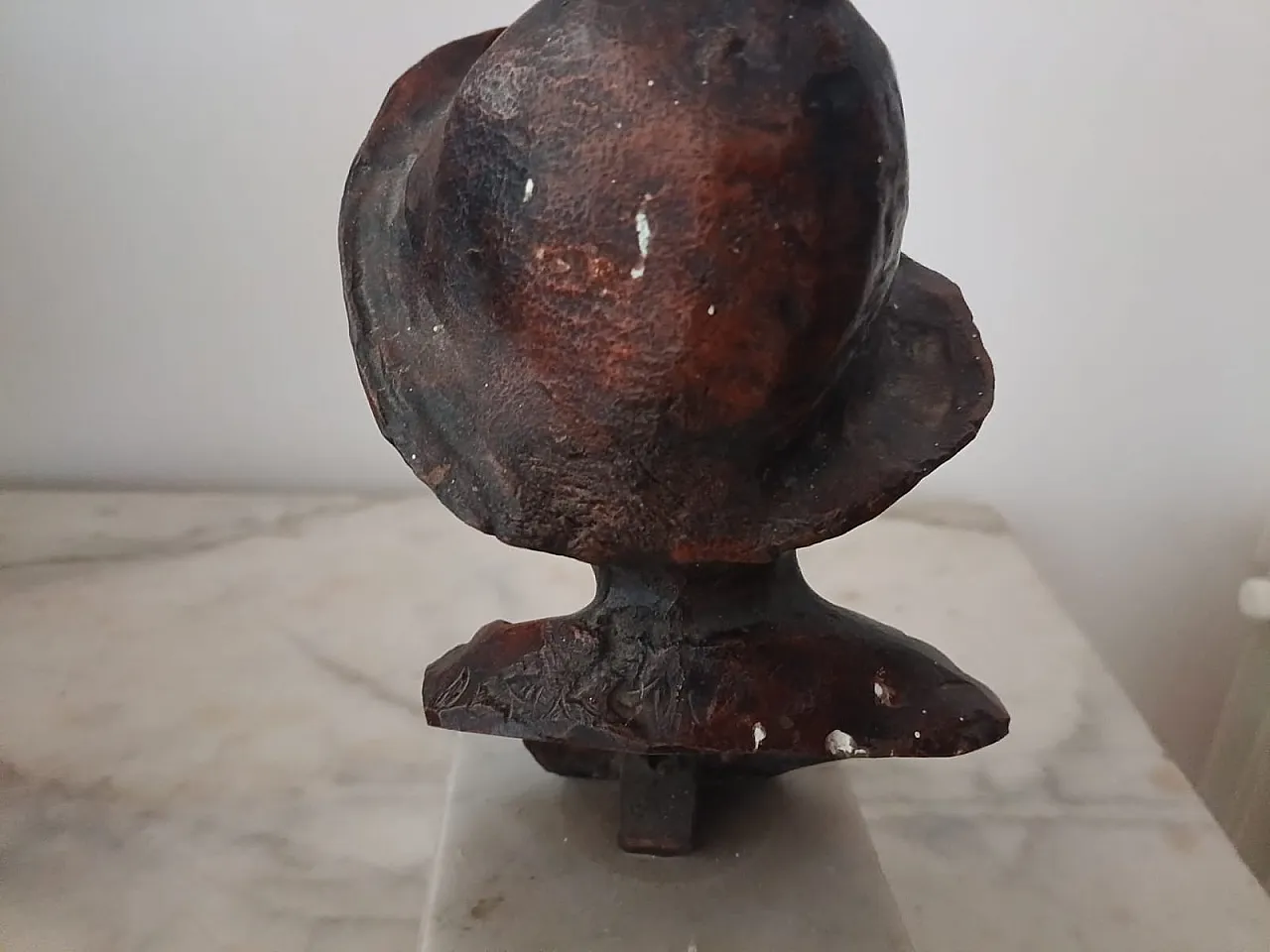 Bust of a young boy with hat, early 20th century 11