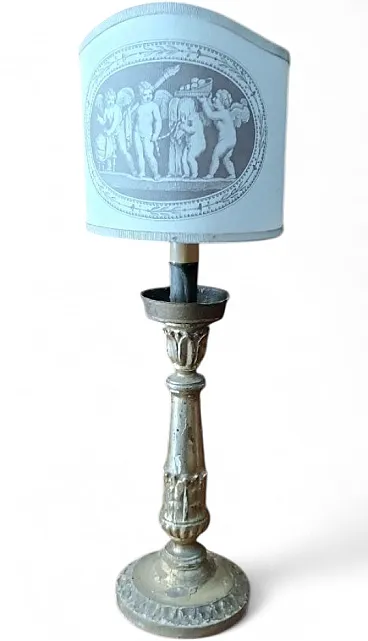 Carved and gilded wooden lamp, early 19th century