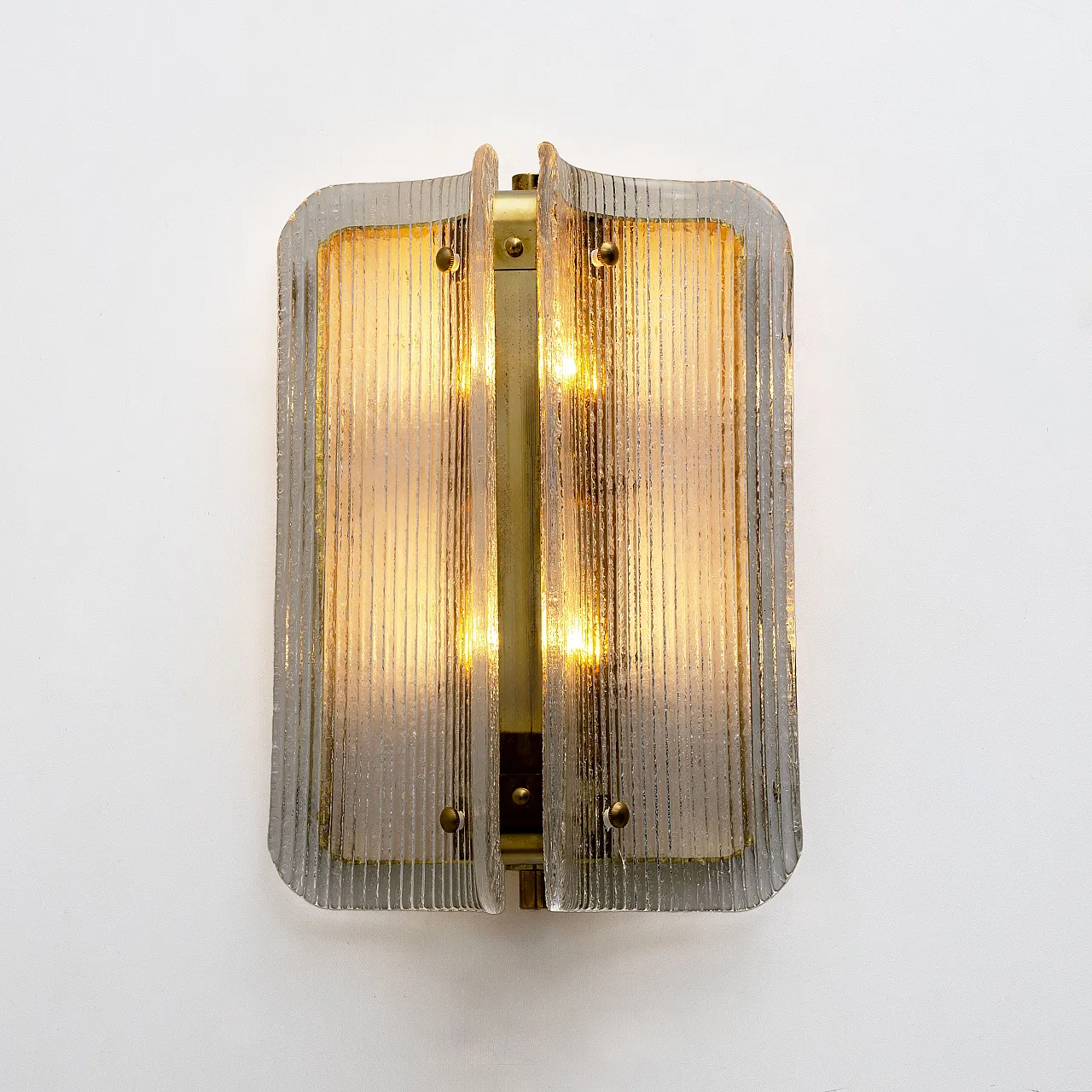 Pair of wall sconces in curved and transparent Murano glass, 2000s 5