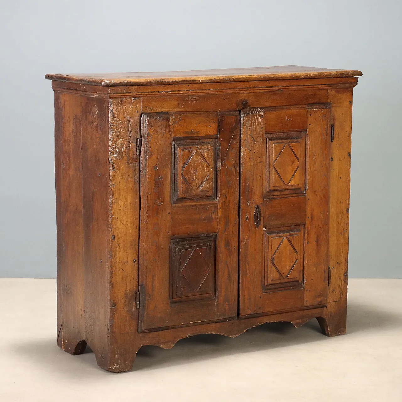 Chestnut sideboard with bipartite paneled doors, 18th century 1