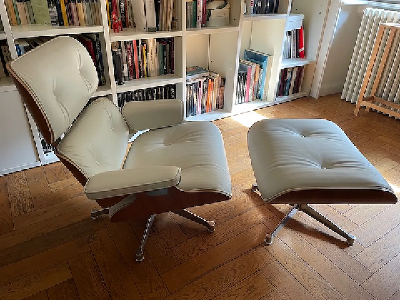 Lounge chair and pouf by Charles & Ray Eames for Vitra, 2000s 2