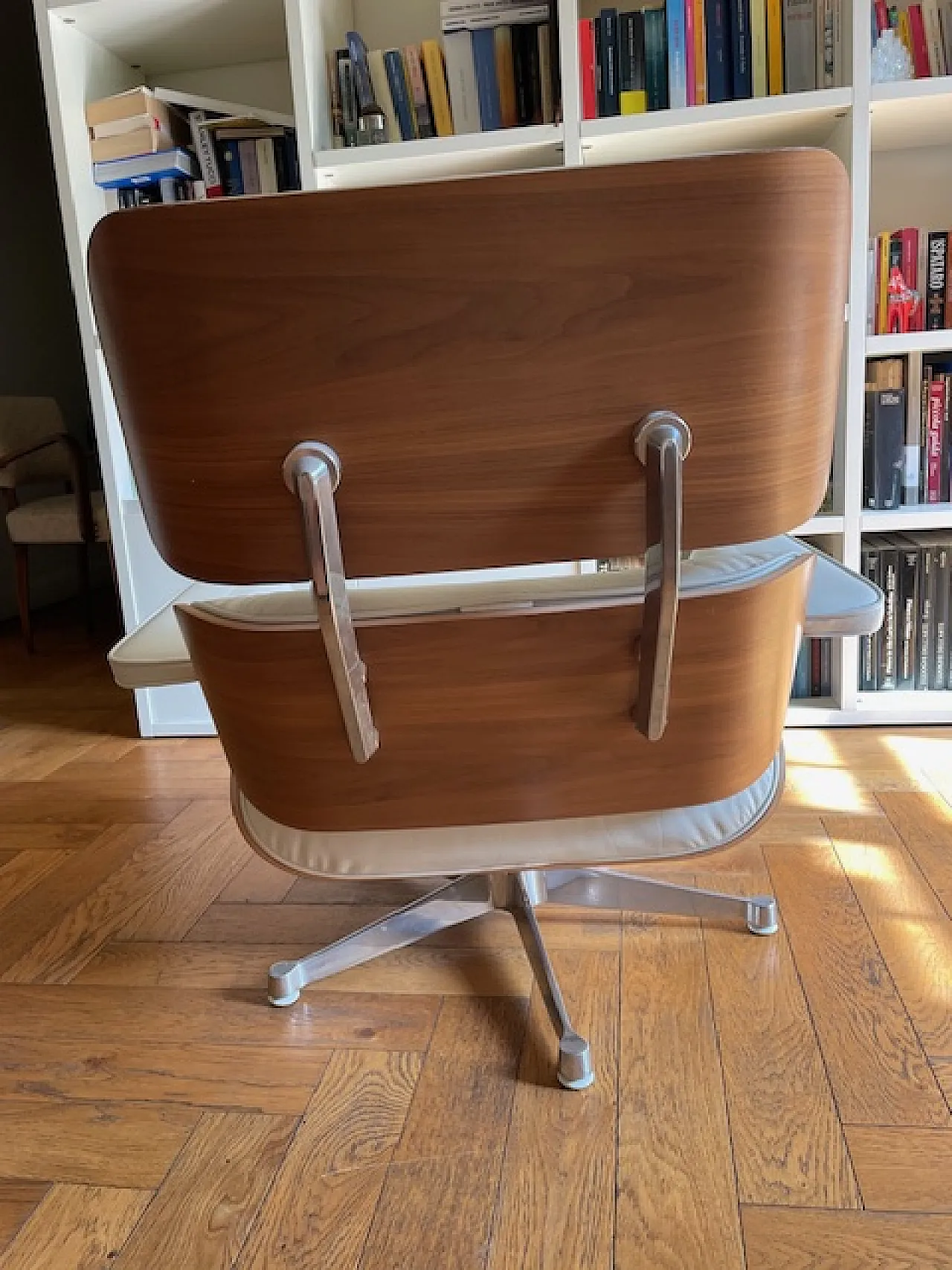 Lounge chair and pouf by Charles & Ray Eames for Vitra, 2000s 4