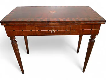 Antique game table. Period of the first half of the 1800s