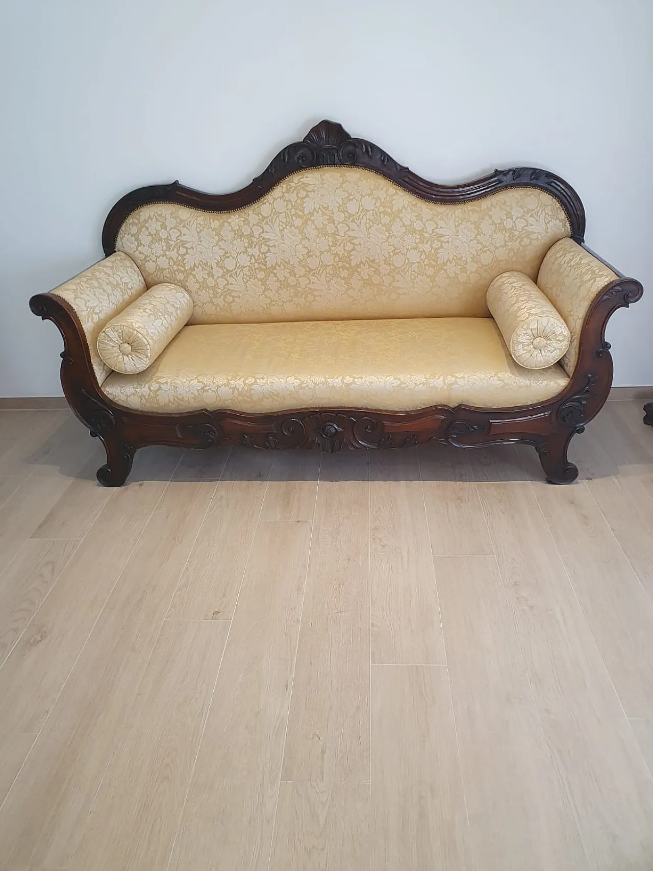 Carved sofa with floral upholstery 1