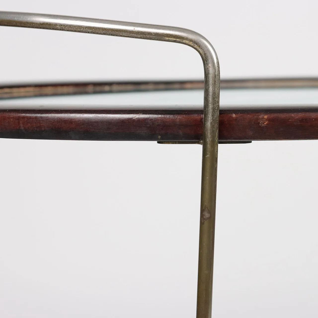 Oval ebony-stained wood and glass bar cart, 1950s 6