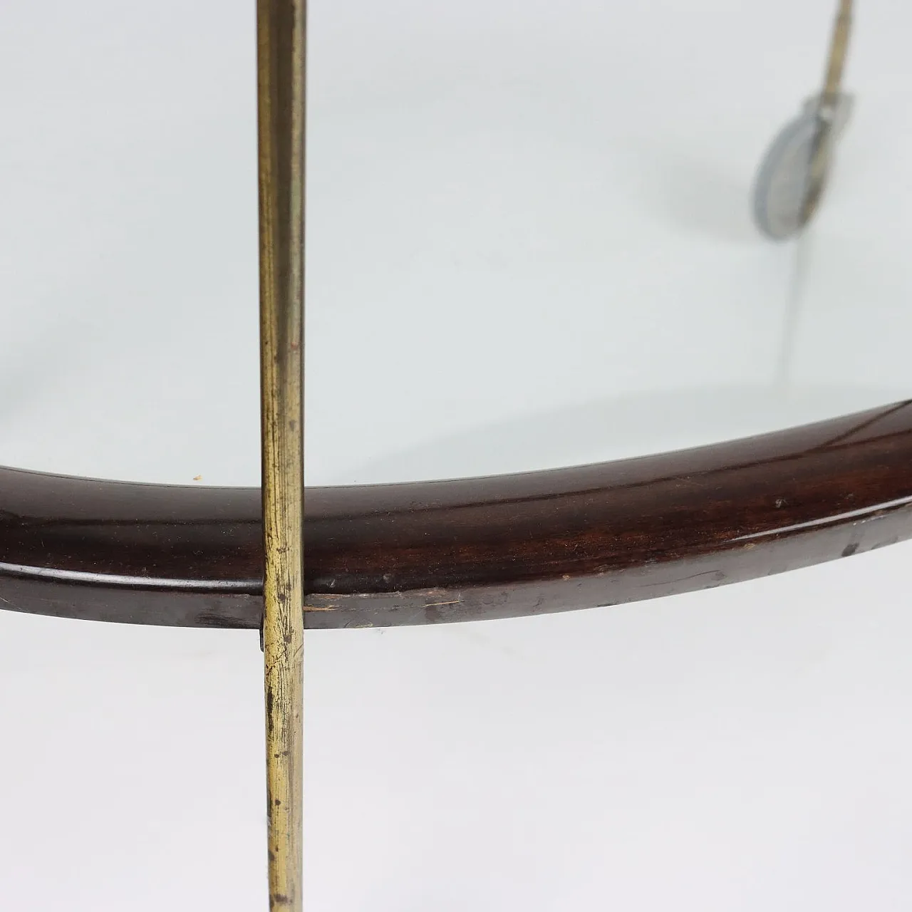 Oval ebony-stained wood and glass bar cart, 1950s 8