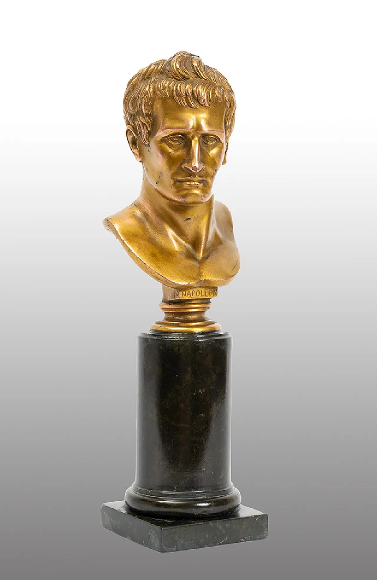 Ancient gilded bronze sculpture depicting Napoleon resting on b 1