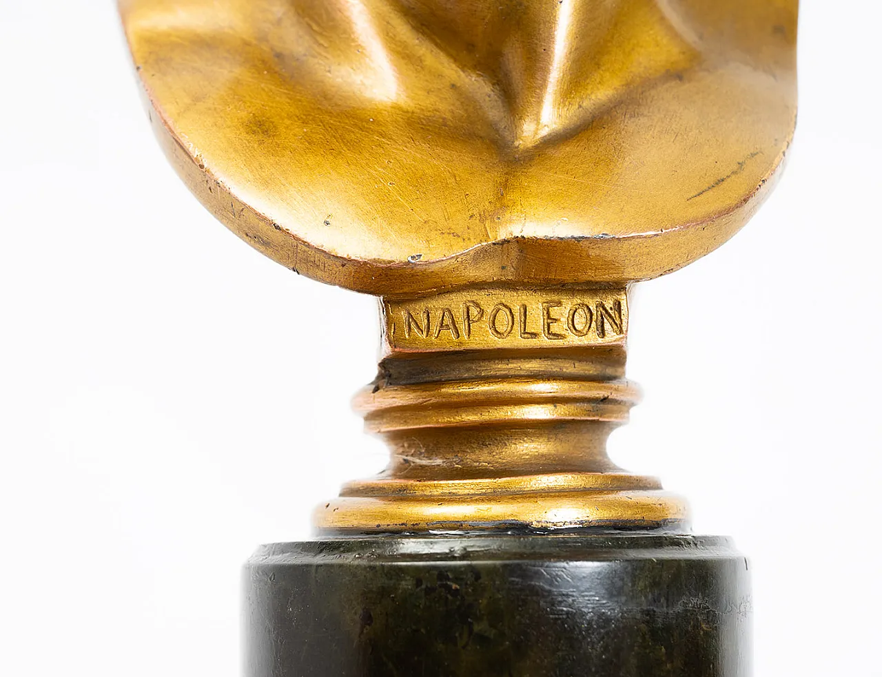 Ancient gilded bronze sculpture depicting Napoleon resting on b 2