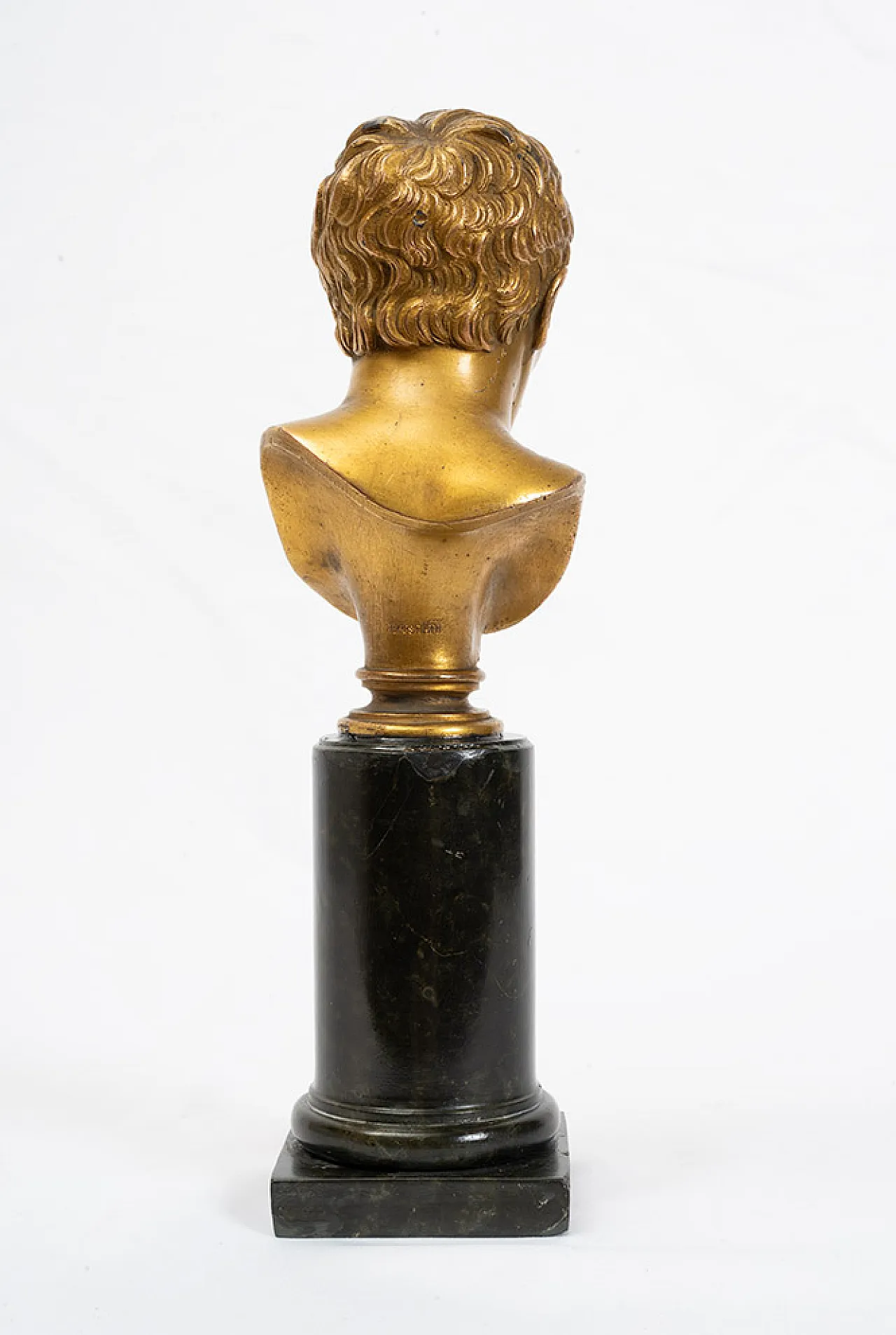 Ancient gilded bronze sculpture depicting Napoleon resting on b 5