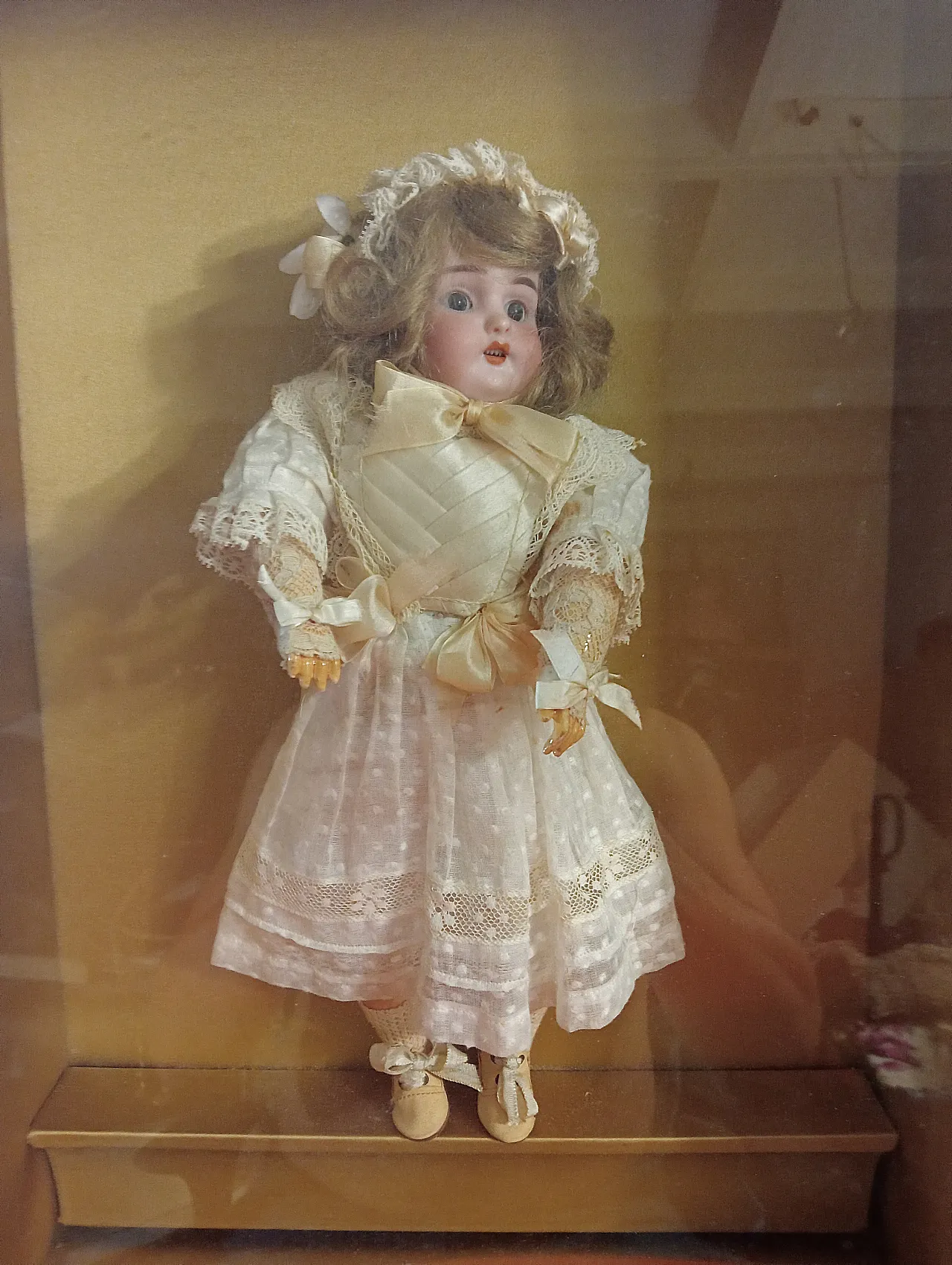 Antique doll in gilded case, late 19th century 4