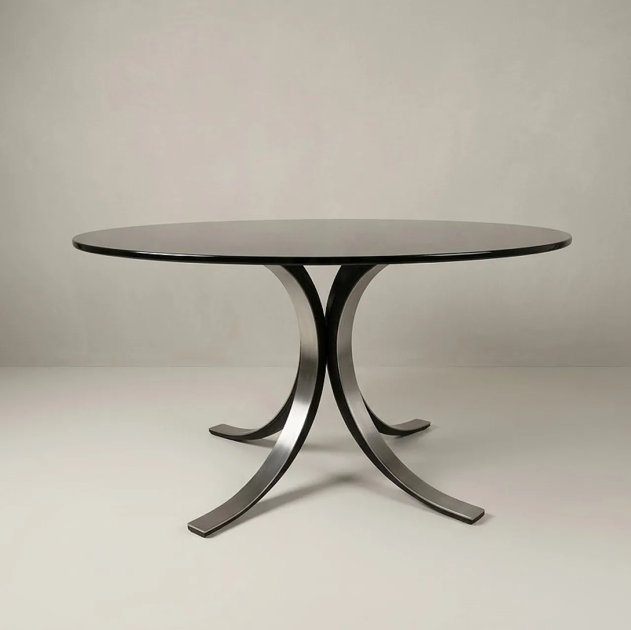 T69 table by Osvaldo Borsani and 4 wheeled chairs by Eugenio Gerli for 5