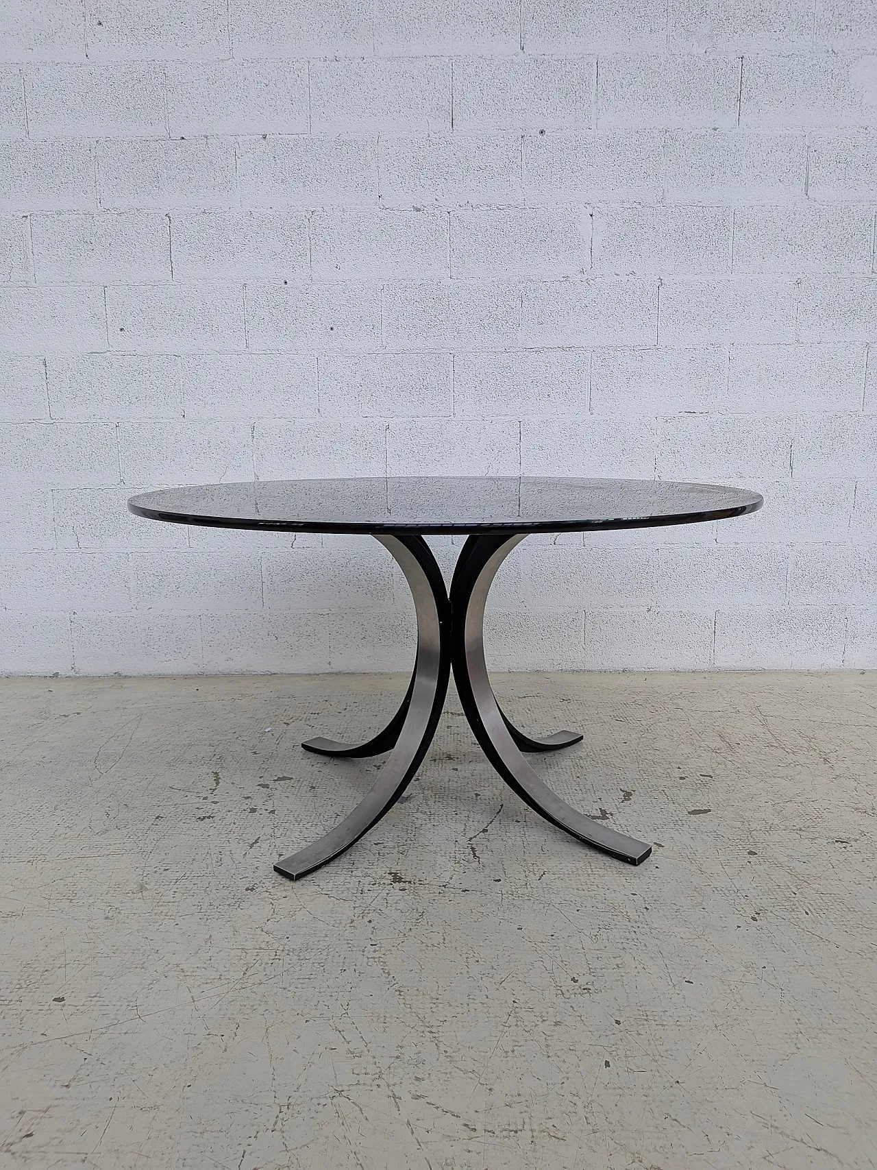 T69 table by Osvaldo Borsani and 4 wheeled chairs by Eugenio Gerli for 9