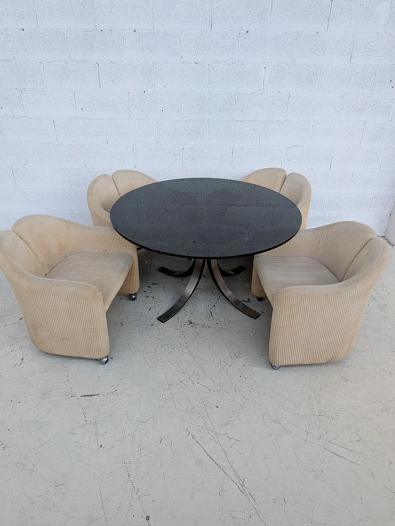 T69 table by Osvaldo Borsani and 4 wheeled chairs by Eugenio Gerli for 11