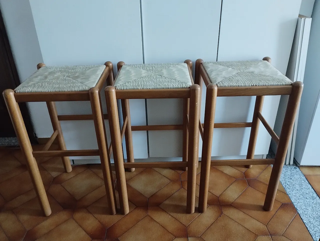 3 wooden bar stools with straw seats, 80s 1