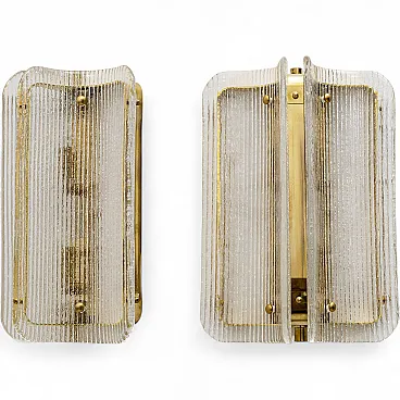 Pair of wall sconces in curved and transparent Murano glass, 2000s