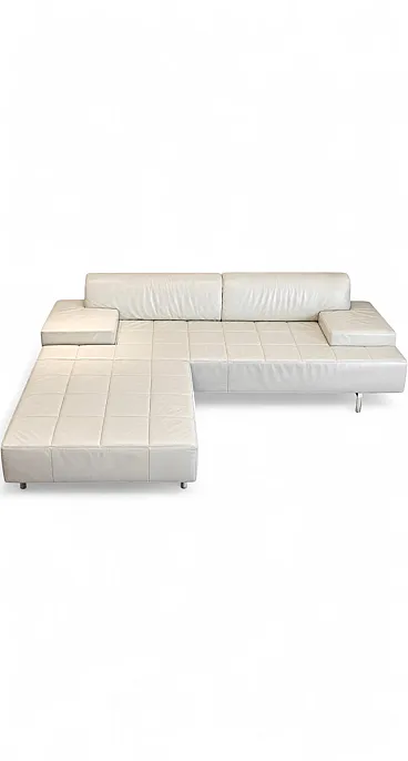 Divano modulare Poltrona Frau Quadra in pelle bianca con pouf Perf