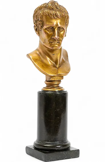 Ancient gilded bronze sculpture depicting Napoleon resting on b