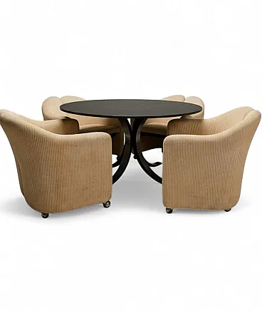 T69 table by Osvaldo Borsani and 4 wheeled chairs by Eugenio Gerli for