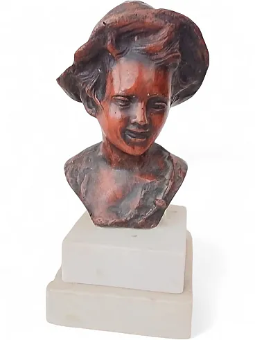 Bust of a young boy with hat, early 20th century